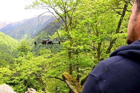 A drone flies over a primeval forest in Romania.